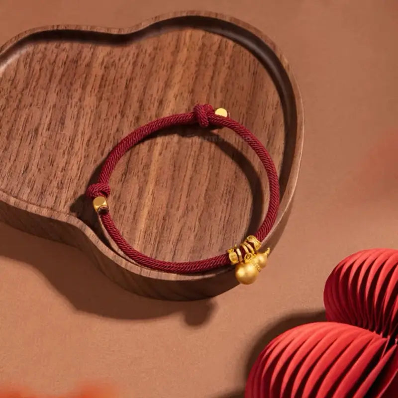 Mount Wutai Blessed Everlasting Blessings of Fortune and Emoluments Gold-Plated Gourd Red Bracelet | Adjustable Drawstring, High-Density Braided Cotton Rope-LuckyCharms.Shop