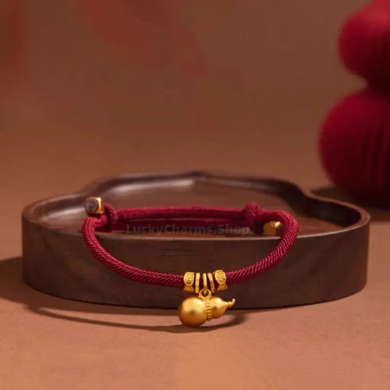 Mount Wutai Blessed Everlasting Blessings of Fortune and Emoluments Gold-Plated Gourd Red Bracelet | Adjustable Drawstring, High-Density Braided Cotton Rope-LuckyCharms.Shop